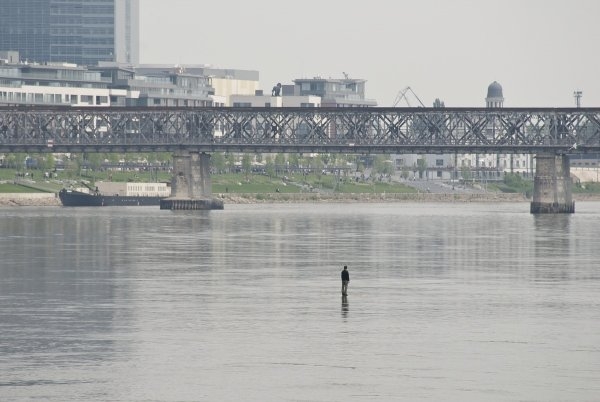 Tomáš Šoltys – Man on the River, 2011, site specific performance, photograph 2,7 x 4 m