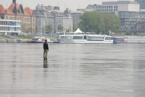 Tomáš Šoltys – Man on the River, 2011, site specific performance, photograph